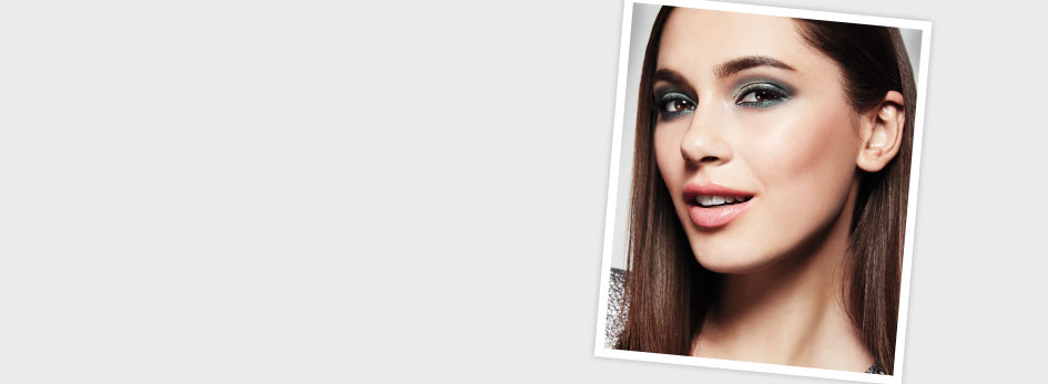 Emerald Eyes Look from Mary Kay, holiday looks, glamorous makeup looks, the latest looks for the holidays, holiday party looks.  Image is a long grey rectangle. In the right corner, a photo showing a smiling brunette wearing silver and green eye shadow with light pink lipstick is displayed.