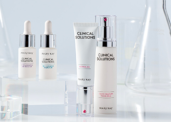 Both Mary Kay Clinical Solutions Boosters next to Mary Kay Clinical Solutions Retinol 0.5 Set with clear flasks