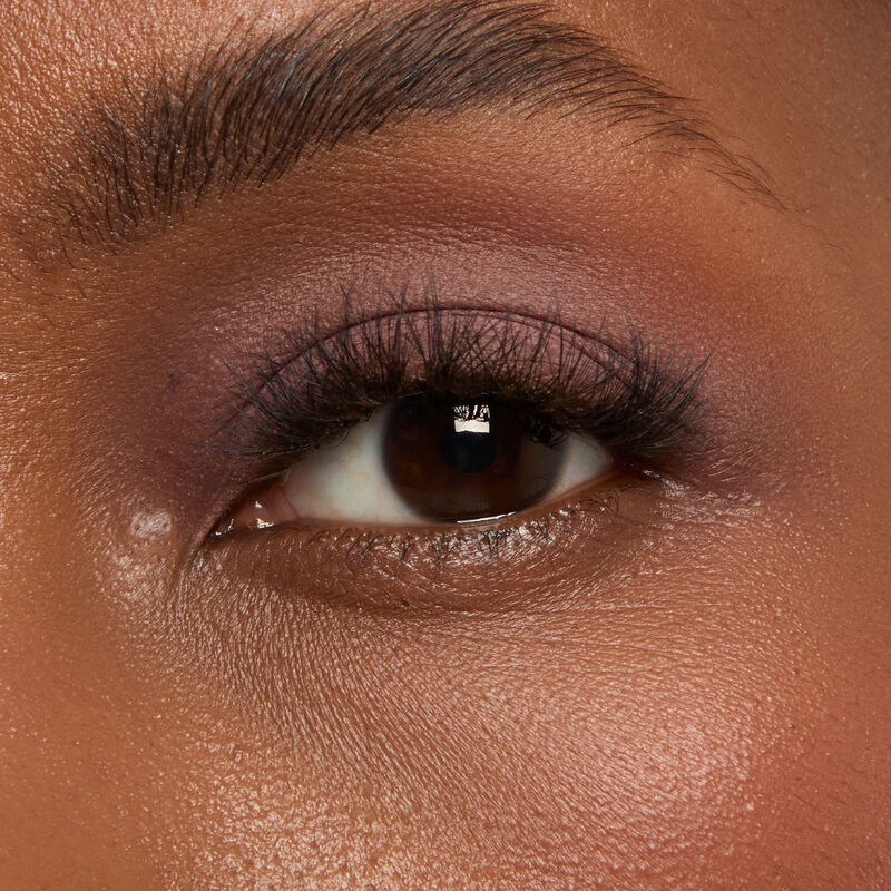 Macro eye shot&nbsp;of Mary Kay&reg;&nbsp;Matte&nbsp;Eye Shadow Stick in&nbsp;Lunar Rose&nbsp;on&nbsp;deep&nbsp;skin tone.