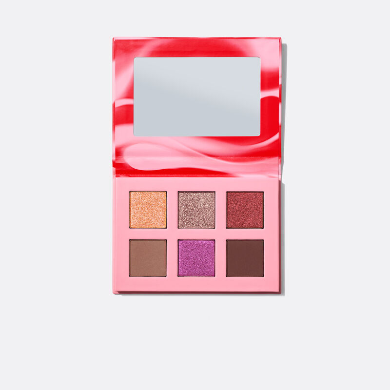 Open limited-edition Mary Kay Eye Shadow Palette in Outer Glow against white background