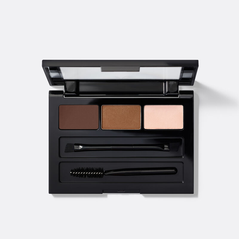 An open compact of limited-edition Mary Kay Brow Kit in shade Brunette against plain background