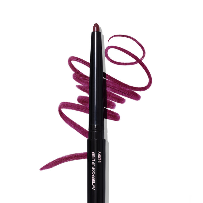 Uncapped Mary Kay Waterproof Lip Liner in Berry against product rub
