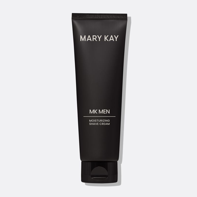 Bottle of MKMen Moisturizing Shave Cream standing on its cap against a plain background