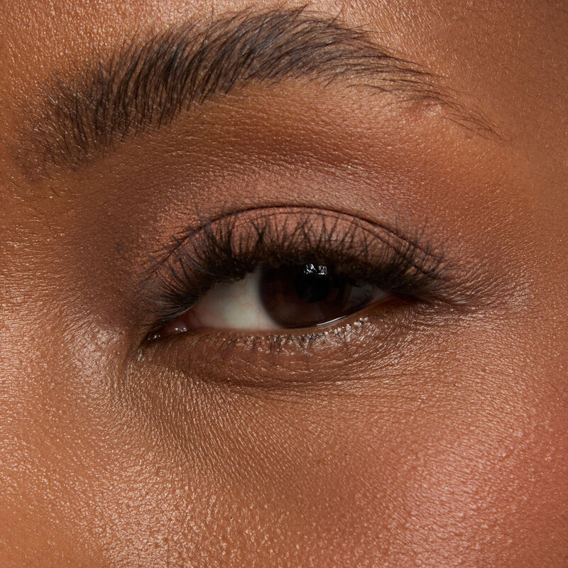 Macro eye shot&nbsp;of Mary Kay&reg;&nbsp;Matte&nbsp;Eye Shadow Stick in Celestial Nude on&nbsp;deep&nbsp;skin tone.&nbsp;