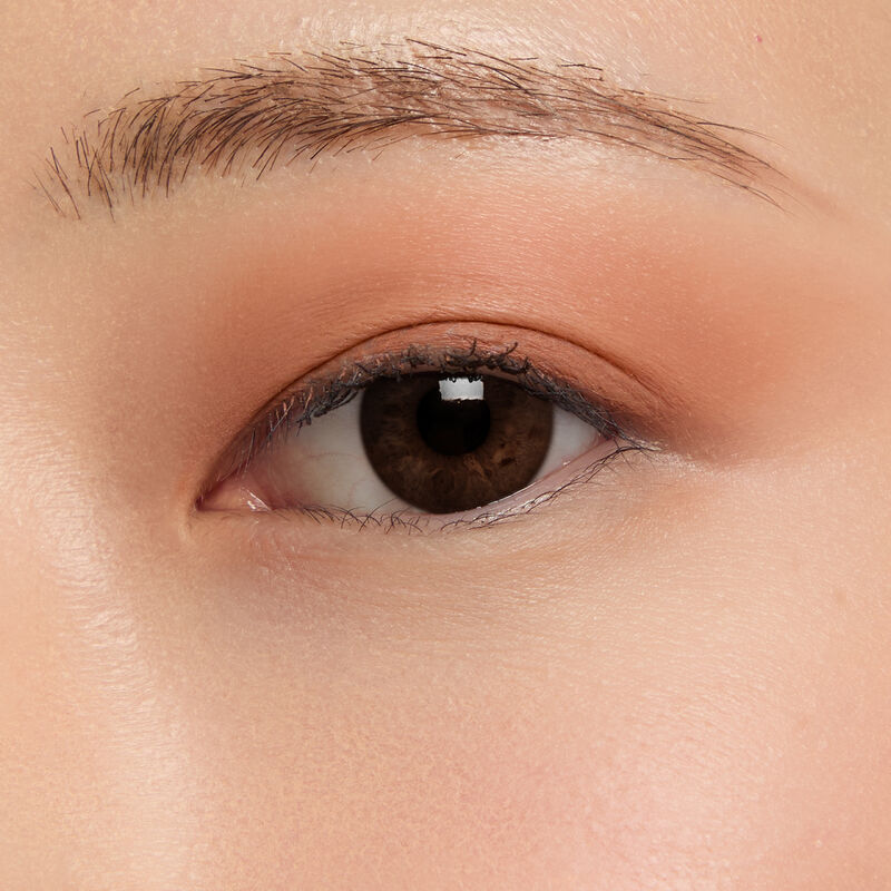 Macro eye shot&nbsp;of Mary Kay&reg;&nbsp;Matte&nbsp;Eye Shadow Stick in&nbsp;Orbit Clay&nbsp;on light skin tone.