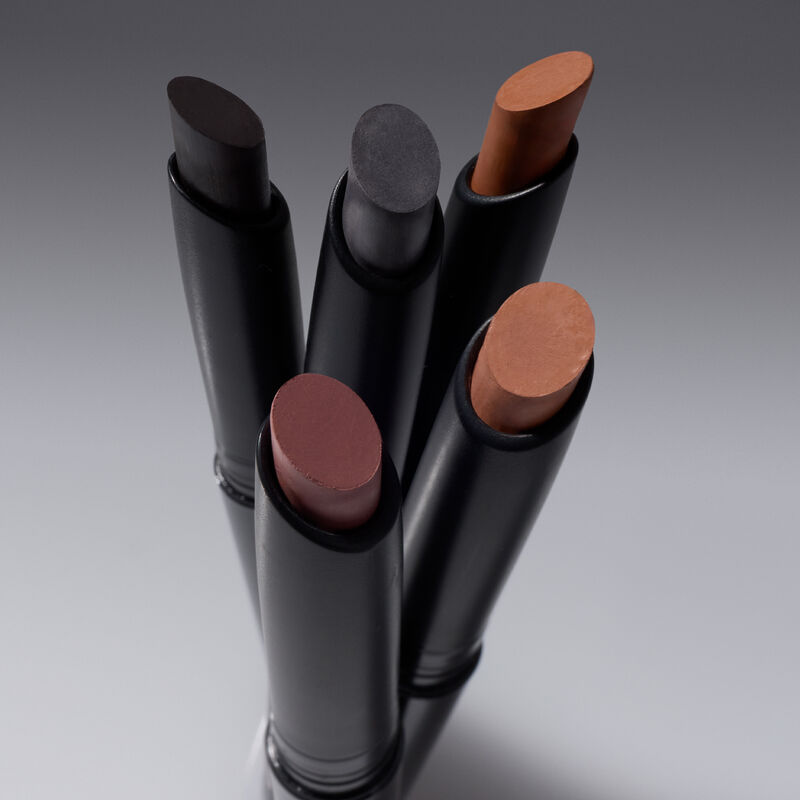 All five Mary Kay&reg; Matte Eye Shadow Sticks with caps off, showing the full shade range.