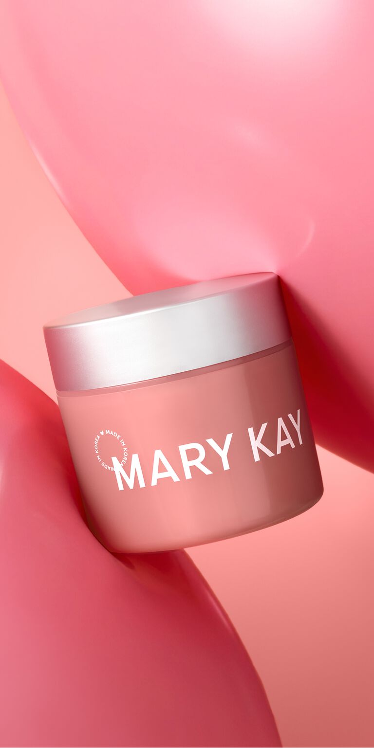 Tarro de gel hidratante con col&aacute;geno de Mary Kay situado entre dos trazos de gel rosa