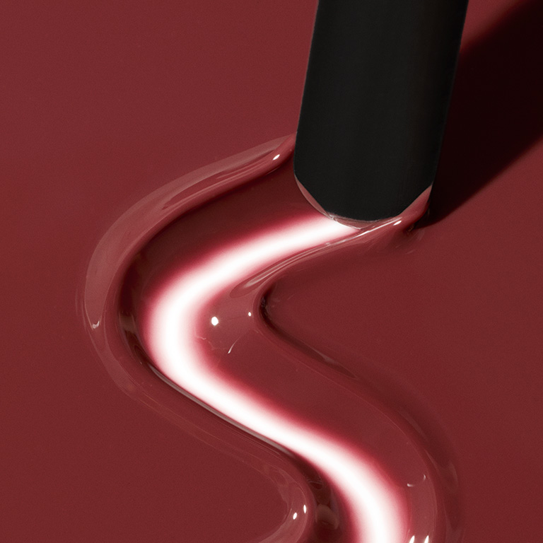 Texture rub of Mary Kay Lip Oil in shade Berry
